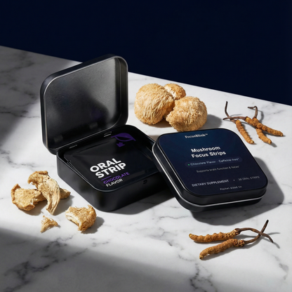 Mushroom focus strips packaging on a marble surface with dried mushrooms around.
